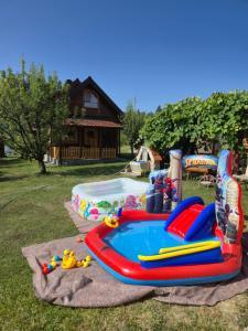 a water park with a pool and a inflatable raftitizername at BRVNARE STOJIĆ in Kokin Brod