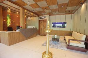 a lobby of a hotel with a waiting room at Ynad Mount Resort in Meppādi +53 photos
