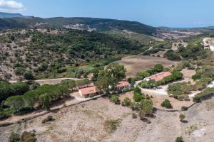 an aerial view of a farm with trees at Residence Hotel Monte Ricciu Nuova Gestione in Alghero