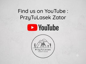 a sign that reads find us on your website joystickactor youtube at PrzyTuLasek - domek pod lasem w sercu natury, blisko Energylandii in Zator +38 photos