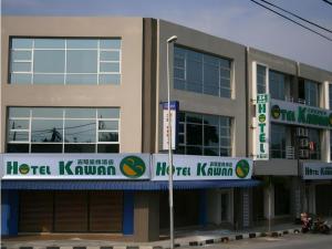 a hotel kuana is on the side of a building at Hotel Kawan in Tapah