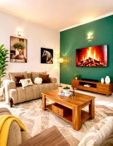 a living room with a couch and a coffee table at The Serenity Hideaway in Arusha