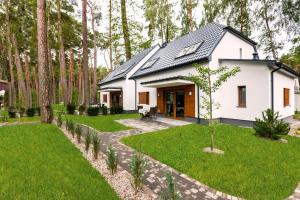 Vonkajšia záhrada v ubytovaní Apartamenty Villa Baltic Sun II i III