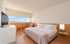 Postel nebo postele na pokoji v ubytování Melia Palma Bay