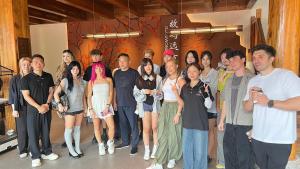 a group of people posing for a picture at Home Away from Home in Zhangjiajie