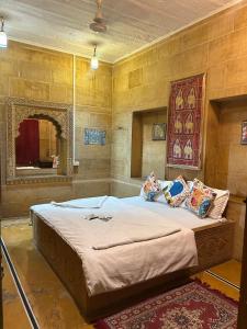 a bedroom with a large bed in a room at Hotel Pol Haveli Jaisalmer in Jaisalmer +41 photos