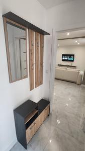 TV a/nebo společenská místnost v ubytování ONE Studio + 3 fotografie