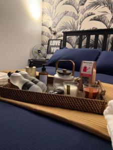 a tray with various items on top of a bed at Rutland Point in Uppingham +11 photos