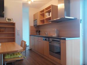 A cozinha ou cozinha compacta de Ferienwohnung Sayntalblick