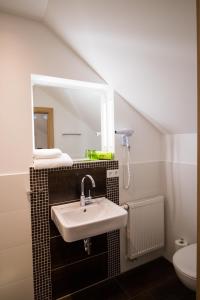 Koupelna v ubytování ROOM'Z zimmeraufzeit