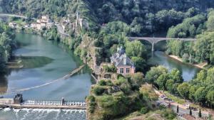 an aerial view of a river with a bridge at Chambres d'Hôtes Le Clos Ambels in Ambialet