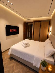 a hotel room with a bed with towels on it at Elegant Studio in Casablanca in Casablanca