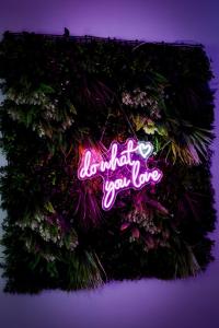 a neon sign that says uphold you love at Dalikyda La Tentation Jacuzzi Cinéma élégant in Le Havre