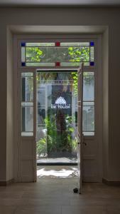 an open door to a house with a window at Hotel del Balneario in Tolox