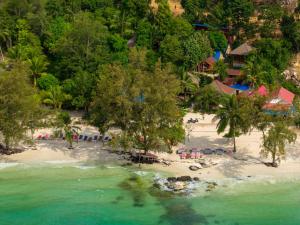 an aerial view of a beach with chairs and trees at Europe Enchanted Resort in Kaôh Rŭng (3)