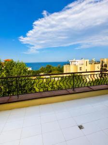 a balcony with a view of the ocean at Hotel Jasmine in Byala