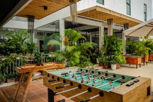 an outdoor pool table with a foosball at Onederz Kampot in Kampot