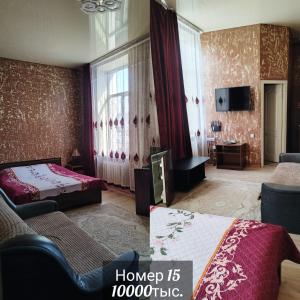 a hotel room with two beds and a television at Швейцария in Karataldy