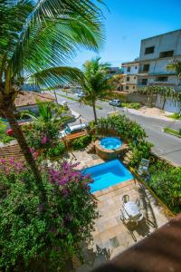an aerial view of a resort with a swimming pool at Pousada Miramar in Marataizes
