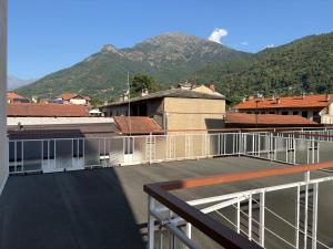 a balcony with a view of a mountain at Rifugio Delia in Torre Pellice