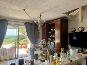 a living room with a view of a living room at La Maison de Marianne in Fleury
