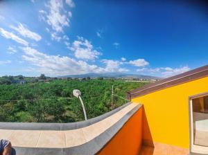 a view from the balcony of a house at La Casa del Cedro - Riposto in Riposto