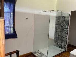 a glass shower in a room with a window at Villa F&B 2 in Solarte +42 photos