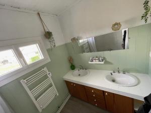a bathroom with a sink and a mirror at Maison de charme à st émilion in Saint-Émilion +28 photos