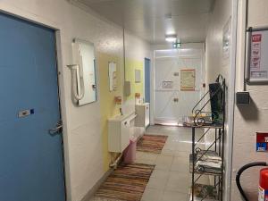 a corridor of a hospital with a hallway with a room at Igloo, Lodge et Tipi confortable in L Honor De Cos +19 photos