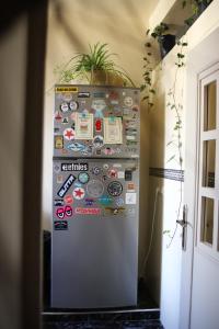 a refrigerator with a plant on top of it at The FlowHost in Tamraght Ouzdar