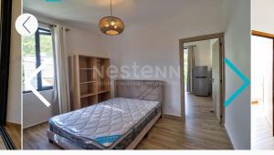 a bedroom with a bed in a room at Maranatha Villa in La Gaulette