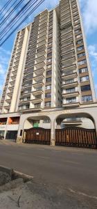 a large white building with a gate in front of it at Meteor Garden in Nairobi
