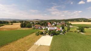 an aerial view of a small village in a green field at klein aber fein in Freudenthal