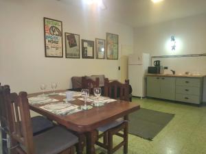 a dining room table with wine glasses on it at Chispa in Santa Rosa