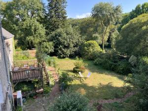 an aerial view of a garden with trees at Le Manoir de Gourvinec in Saint-Nolff +1 photo