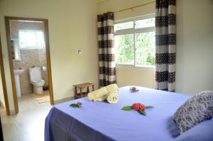 Postel nebo postele na pokoji v ubytování Mountain Lodge