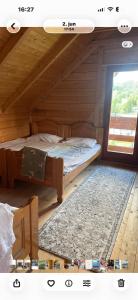 a bedroom with a bed and a window at Grand house in Rožaje