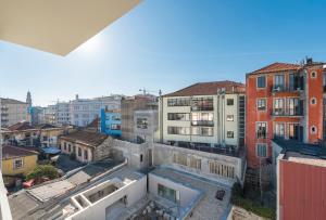 an aerial view of a city with buildings at Bright Downtown Apartment in Porto