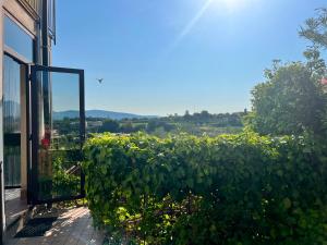 a view from the balcony of a house at Maison Margherita in Calmasino