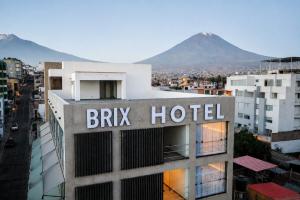 a hotel with a sign on the top of a building at BRIX Hotel in Arequipa