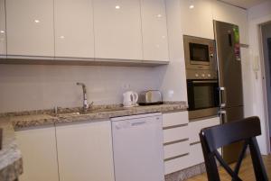 Kuchyňa alebo kuchynka v ubytovaní Apartamento Rialto
