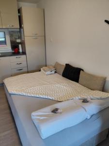 a bedroom with a large bed in a room at Apartma Sonček in Šentjur