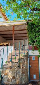 a porch of a house with a gate at GADD Ferienwohnung 004 Glück an der Donau I Best Prestige Stay 24 h Check-In in Straubing