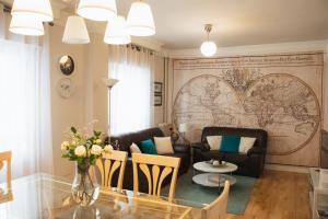 a living room with a couch and a table at Mundo in Tudela