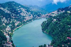 an aerial view of a river in a valley at Naini reflections in Nainital