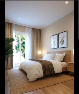 a bedroom with a large bed and a window at Naini reflections in Nainital
