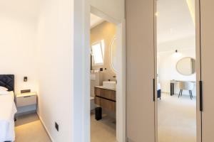 a bathroom with a sink and a mirror at Stone house Mia in Čara +41 photos