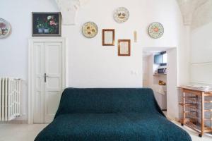 A bed or beds in a room at Casa Meravigliosa