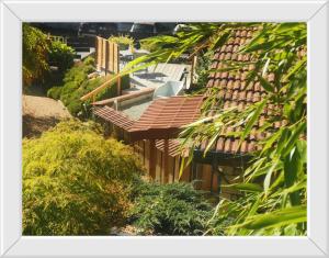 an overhead view of a house with a roof at Chambre d'hôtes de Marie in Chémery