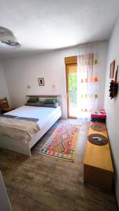 a bedroom with a large bed and a window at B&B Hidden gem Blagaj in Blagaj +31 photos